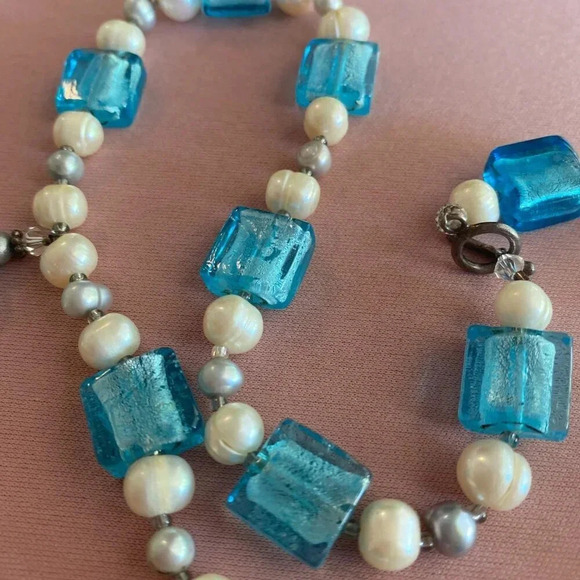 This necklace and earring set features aqua blue molded glass beads and a pearl— - Picture 5 of 5